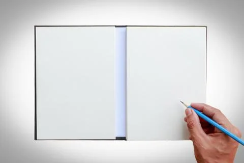Hand use pencil write on notebook Stock Photos