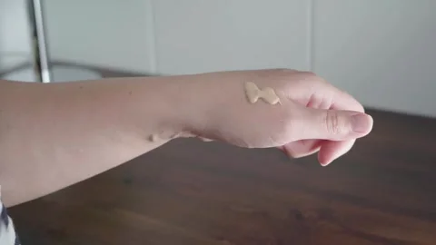 Hand Used As Palette While Pumping Liquid Foundation Stock Footage 342053284