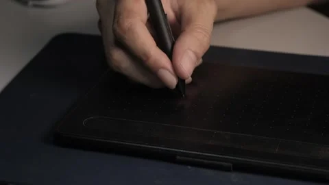 Hand useing pen mouse Stock Footage 309218749