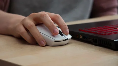 Hand uses a computer mouse, close-up Stock Footage 229539641