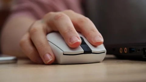Hand uses a computer mouse, close-up Stock Footage 229539660