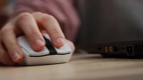 Hand uses a computer mouse, close-up Stock Footage 229539662