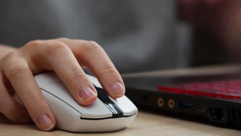 Hand uses a computer mouse, close-up Stock Footage 229539671