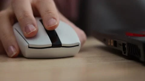 Hand uses a computer mouse, close-up Stock Footage 229539675