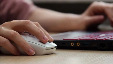 Hand uses a computer mouse, close-up Stock Footage 229539676