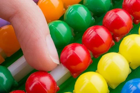 Hand using an abacus Stock Photos