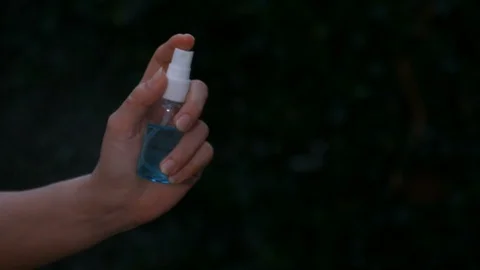 Hand using alcohol spray for protect from infection of virus and germ Covid-19  Video stock 130095880