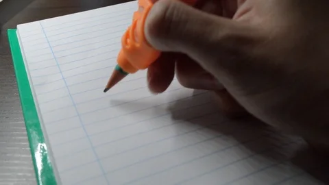 Hand using Anti-Shortsighted Pencil Holder made with Silicone for Childrens 스톡 동영상 114776121