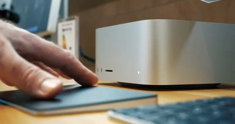 Hand Using Apple Magic Trackpad with Mac Studio Stock Footage 312177884