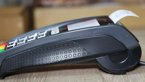 Hand using bank terminal for credit card payment Stock Footage 89869467