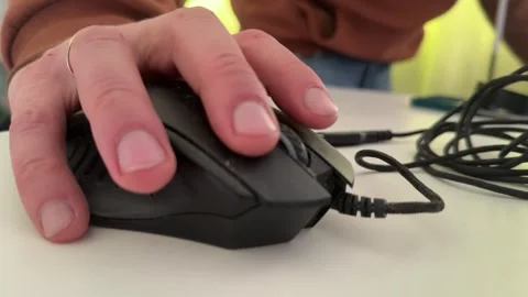 Hand using black computer mouse on desk close up, office work and productivity Video stock 337120201