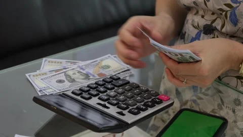 Hand using a calculator Stock Footage 249377829