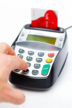 Hand using chip and pin machine Stock Photos