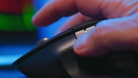 Hand using computer mouse in colorful bokeh light Stock Footage 325972588