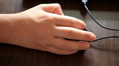 Hand using computer mouse driver - closeup Stock Footage 56308203
