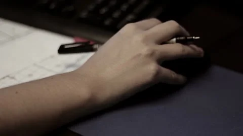 Hand using computer mouse Stock Footage