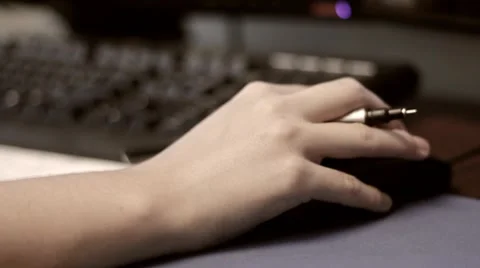 A hand using a computer mouse Stock Footage 8360228