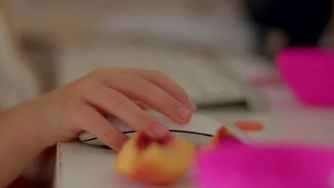 Hand using computer mouse at graduation celebration desk Stockbeeldmateriaal 347205658