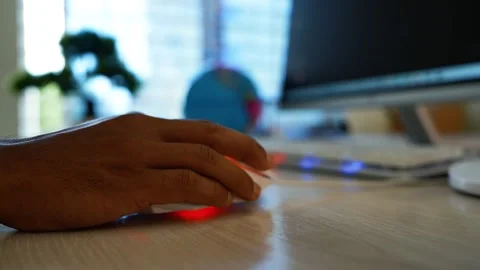 Hand using computer mouse at home office, Close-up of a hand using a comput.. Stock Footage 346463438