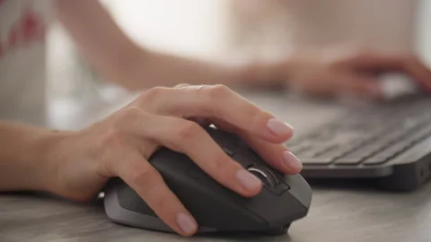 Hand Using a Computer Mouse with Keyboard in Background Stock Footage 291153651