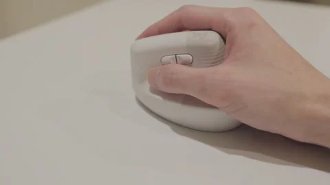 Hand using a computer mouse for navigation, clicking, and smooth control. Stock Footage 305125275