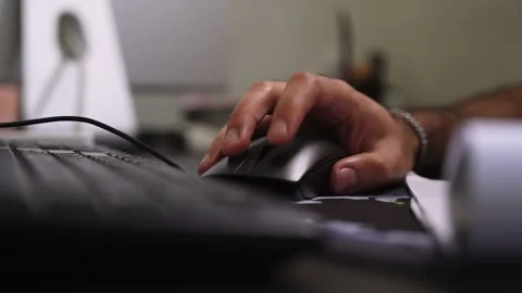 Hand using computer mouse in office Stock Footage 334091630