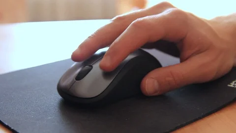 Hand using computer mouse on the rug Stock Footage 96422267