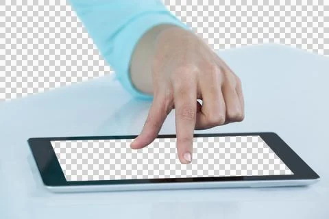 Hand using digital tablet against white background Stock Photos