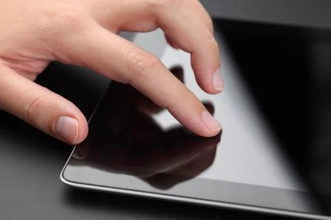 Hand Using Digital Tablet Stock Photos