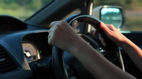Hand using drive car at sunset Video stock 274051982