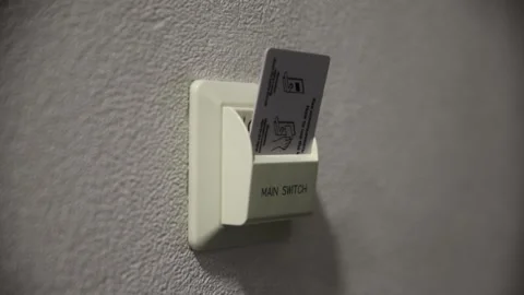 Hand Using Electronic Smart Contactless Key Card turn off the electricity In Vídeo Stock 330370904