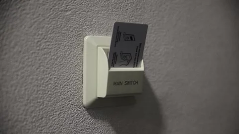 Hand Using Electronic Smart Contactless Key Card turn on the electricity In Vídeo Stock 330371716