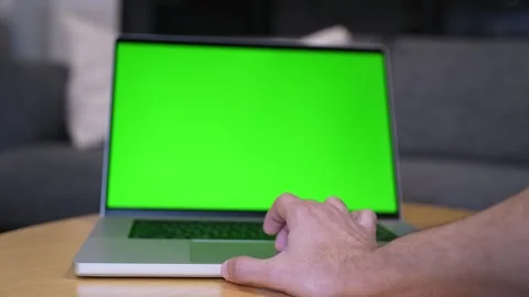 Hand Using Green Screen Laptop Trackpad At Home Stock Footage 337701565