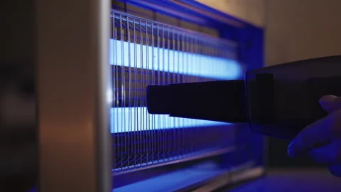 Hand using handheld vacuum cleaner for hygienic cleaning and maintenance of Stock Footage 321401470