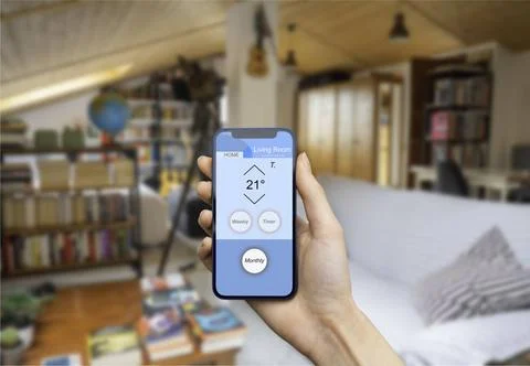 Hand using home automation app for home smart technology Hand holding a mo... Foto stock