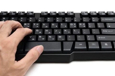 Hand using keyboard on white background Stock Photos