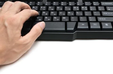 Hand using keyboard on white background Stock Photos