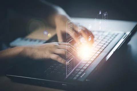 Hand using laptop and touch folder of document Management System, online docu 스톡 사진