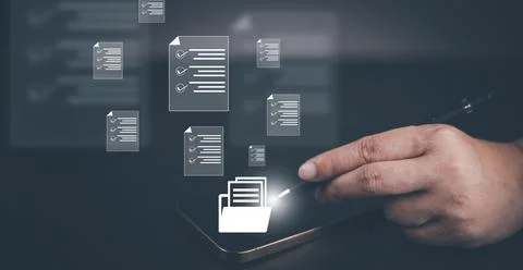 Hand using laptop and touch folder of document Management System, online docu Stock Photos