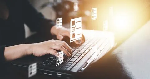 Hand using laptop and touch folder of document Management System, online docu Stock Photos