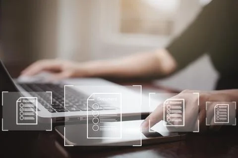 Hand using laptop and touch folder of document Management System, online docu Stock Photos