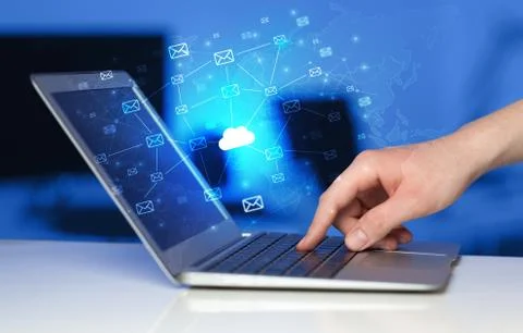 Hand using laptop with centralized cloud computing system concept 스톡 사진
