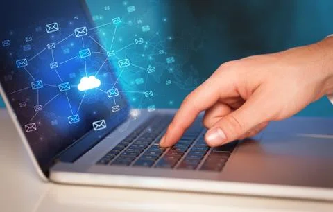 Hand using laptop with centralized cloud computing system concept 스톡 사진