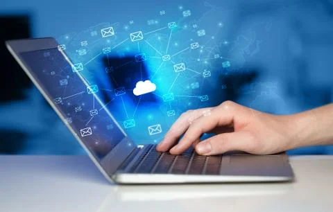 Hand using laptop with centralized cloud computing system concept 스톡 사진