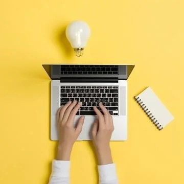 Hand using laptop computer with light Ilustración de archivo