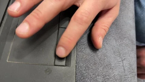 Hand using laptop touchpad close up, computer navigation and remote work Video stock 337121444