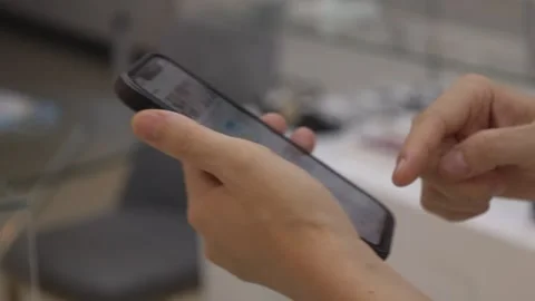 hand using mobile phone, hand holding ph... | Stock Video | Pond5