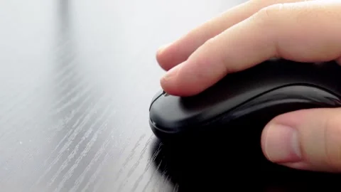 Hand using a mouse close up Stock Footage 331127384