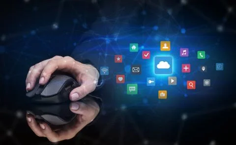 Hand using mouse with cloud technology and online storage concept Stock Photos