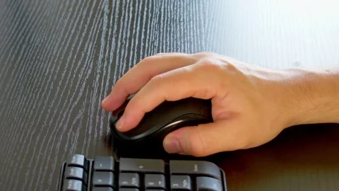 Hand using a mouse Stock Footage 331127365